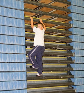 Boy on Bleacher canstockphoto cropped16207307